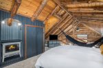 The electric fireplace creates ambiance during the winter months